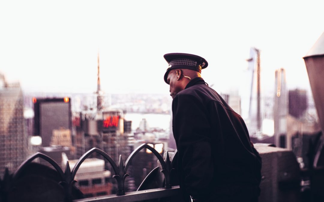 Security personnel on the roof of a building